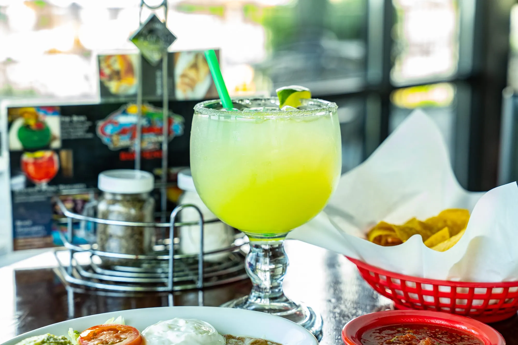 A classic lime margarita in a salt-rimmed glass at Cozumel