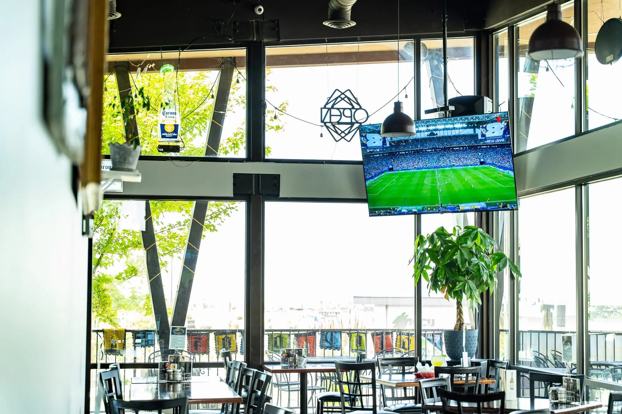 Cozumel’s bright, contemporary dining room with large picture windows and warm natural light