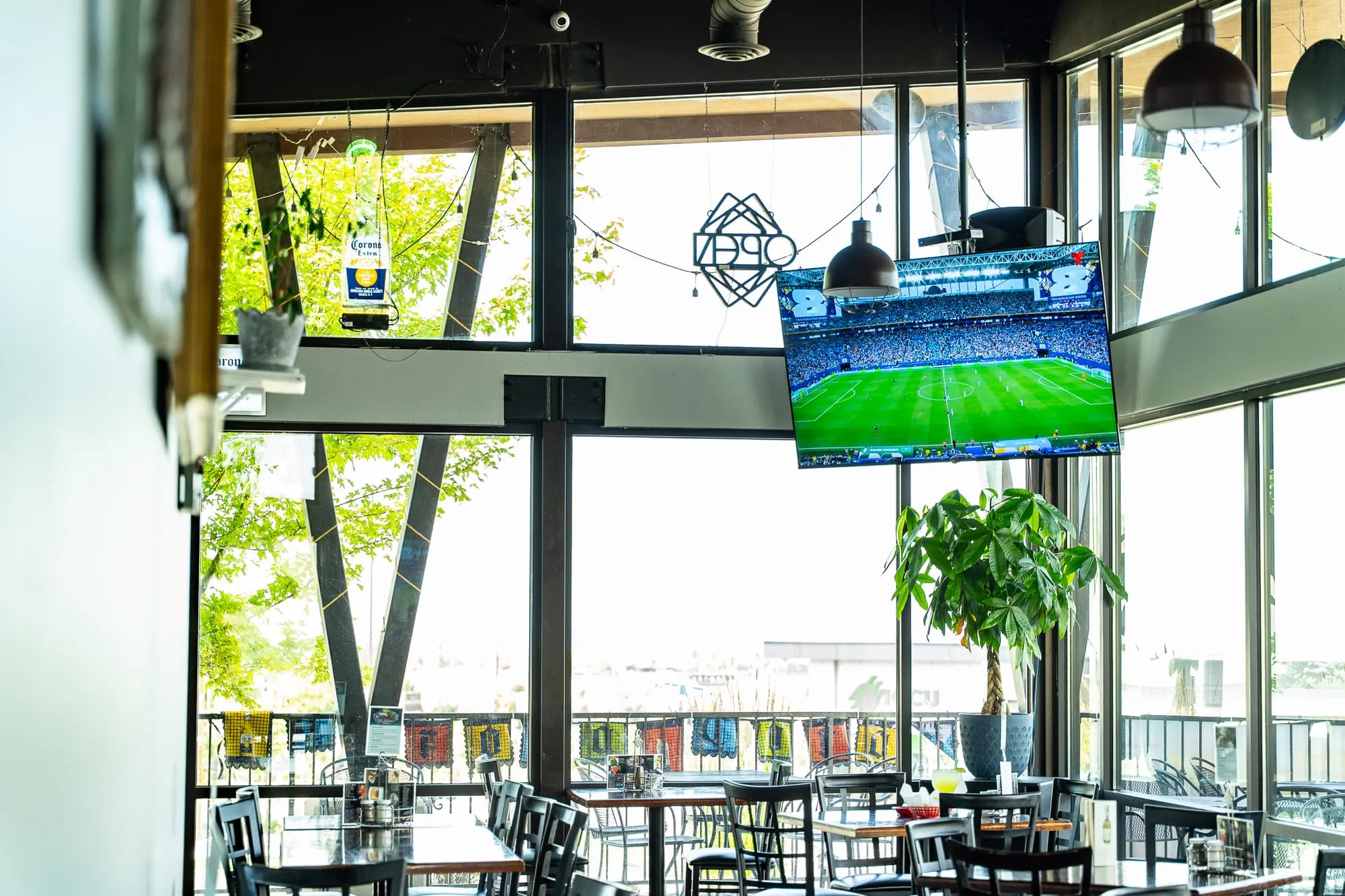 Cozumel’s bright, contemporary dining room with large picture windows and warm natural light